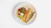 Objednať Filetto di Branzino al burro, limone e caponata siciliana