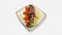 Objednať Tagliata di manzo con rucola, pomodorini e scaglie di parmigiano