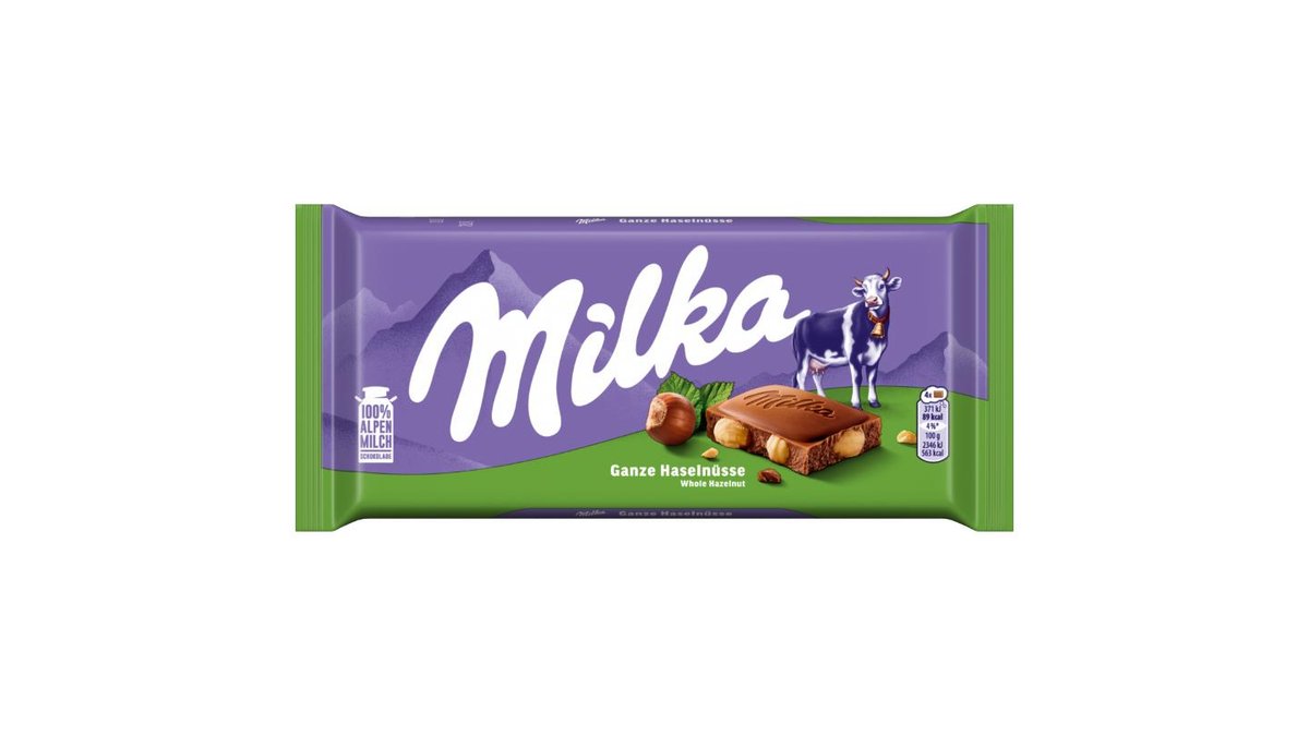 Milka Mliečna čokoláda z alpského mlieka s celými lieskovými orechami, 95 g