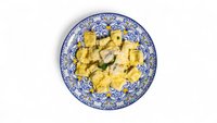 Objednať Ravioli, ricotta e spinaci al tartufo