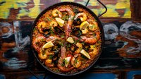 Objednať Paella s mořskými plody a kousky ryb pro 2 osoby