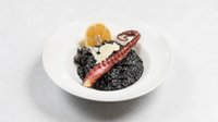 Objednať Grilované chapadlo chobotnice na černém sepiovém rizotu