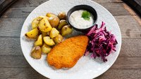 Objednať Veganský řízek s opečeným bramborem, salátkem a naší tatarkou.