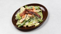 Objednať Caesar - římský salát s grilovaným kuřecím filé, restovanou pancettou, krutóny a dresinkem