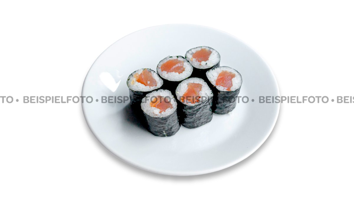 Gunkan Maki Sushi of fish salmon, scallop, perch, eel, shrimp and