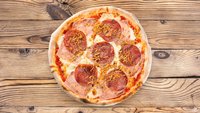 Hozzáadás a kosárhoz Sonkás-szalámis Pizza