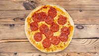 Hozzáadás a kosárhoz Tejfölös-szalámis Pizza